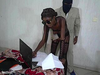 African secretary removes her clothes in front of boss due to forgotten costume, revealing skinny body.