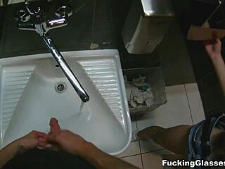 Teen in glasses reaches orgasm in public restroom