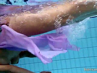 I love Aneta's big tits in that purple dress by the pool