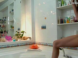 Hot beauty Dasha plays with herself in the shower, indulging in sensual masturbation