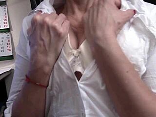 Julia, the sexy secretary with big natural tits, masturbates at work