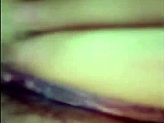 Asian woman spreads legs, uses toy in intriguing video