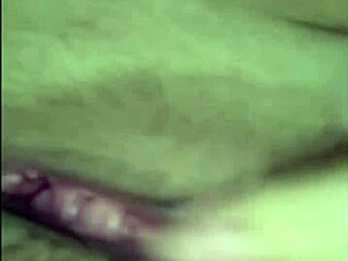 Asian woman spreads legs, uses toy in intriguing video