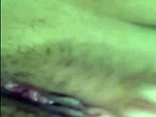 Asian woman spreads legs, uses toy in intriguing video