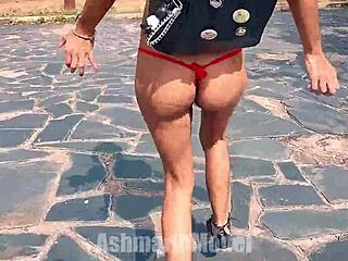 A hairy girl advertises her tits bouncing out of a sports outfit