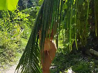a naked girl gets photographed in the amazon jungle