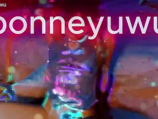 bonneyuwu masturbating on bed with transparent dildo