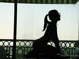 I watch Bigtittygothegg ride the silhouette dildo passionately