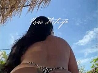 Married wife showing off big ass in bikini on beach