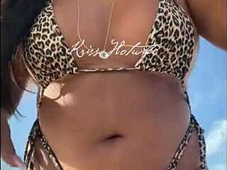 Married wife showing off big ass in bikini on beach