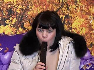 milf in down coat and furry hood sucks big dildo in multiple positions amateur-style