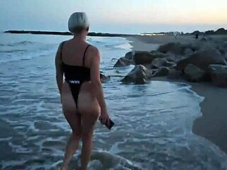 Blonde flashing tits and sucking cock on the beach, so public!