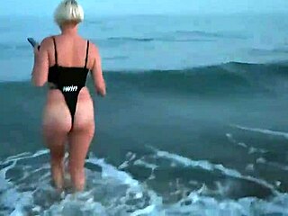 Blonde flashing tits and sucking cock on the beach, so public!