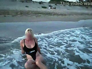 Blonde flashing tits and sucking cock on the beach, so public!