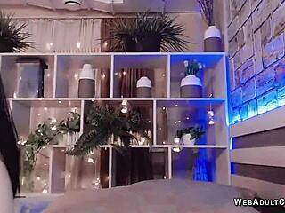 Japanese babe fingers her shaved pussy on webcam