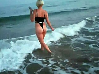 oh god, that blonde flashing her tits and sucking cock on the public beach feels so thrilling and wild