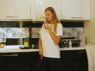 Sexy Blonde Eats Egg in Food Fetish Scene