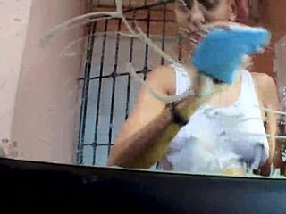 In this casual carwash scene, the Latina babe shows off her hairy beaver while barefoot