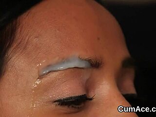 Nasty babe eagerly sucks sperm while getting a load on her face