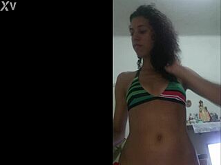 beautiful babe teases with wet pussy in red bikini!