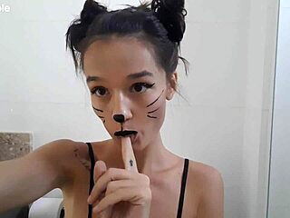 Cute skinny teen in bathroom with body painting