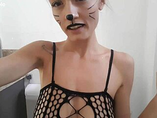 Cute skinny teen in bathroom with body painting