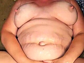 Husband Pisses On His Whore Wife's Big Tits In This Raw Fetish Video Scene