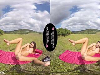 Solo brunette Vanessa Decker with tattoos masturbates using toys in an outdoor VR setting.