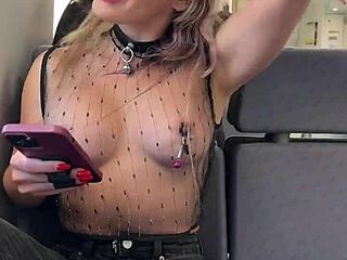 Playing With Pierced Nipples On Train In Sheer Top