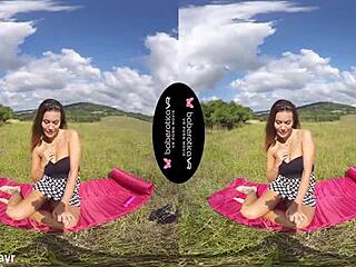 Solo brunette Vanessa Decker with tattoos masturbates using toys in an outdoor VR setting.