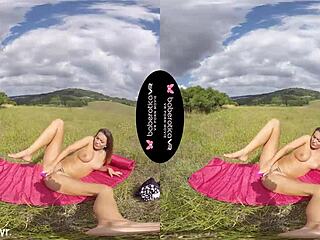 Solo brunette Vanessa Decker with tattoos masturbates using toys in an outdoor VR setting.