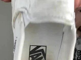 i see the girl removing her sneakers and showing bare feet