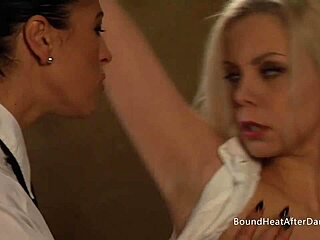 blonde lesbian slave kissing and touching dom madame in bdsm scene