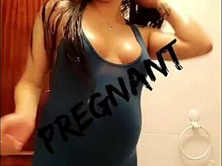 Hot Spanish pregnant housewife flashes small waist in homemade video