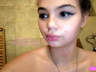 Smoking in the bathtub with a brunette woman