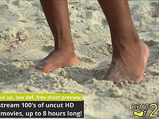 Petite brunette teen giggles with sandy feet at the beach in dirty fetish play