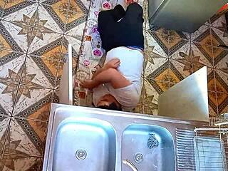 Unfaithful wife sneaks passionate encounter with plumber in kitchen