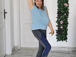 I love how my busty braless gilf body moves in sporty groove strip dancing style