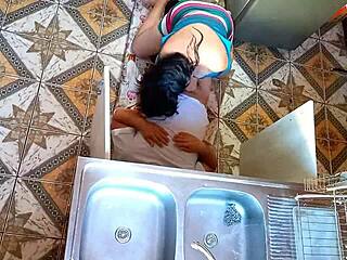 Unfaithful wife sneaks passionate encounter with plumber in kitchen