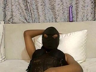 Curvy black slut masturbates