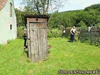 redhead gets pissed on and cum sprayed in outdoor group fun