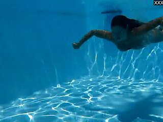 Beautiful big tits Hungarian babe Angelica Heart dives underwater in bikini at pool