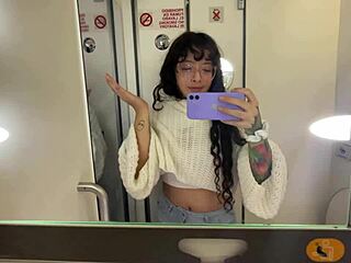 I just had to pee so bad on my Europe trip right there on the plane with my curly hair and tattoos showing