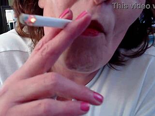Dawnskye1962 smokes a cigarette fully dressed teasing to make your cock throb hard