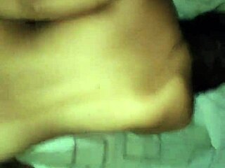 intriguing super model poses bent over in stylish outfit