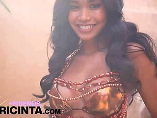horny asian babe putri cinta reveals her huge tits in a playful display