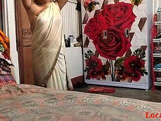 In this homemade scene, the ebony wife bends over doggystyle while her husband pounds her tight pussy roughly.