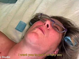 Granny's tight ass gets stretched wide by a massive black cock in intense interracial anal action.