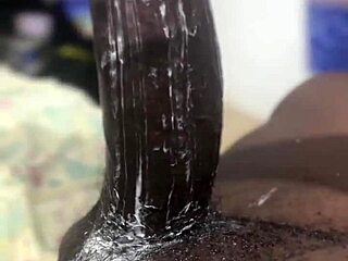 hey, wanna see this huge thick black dick guy cream a throat toy in solo masturbation?