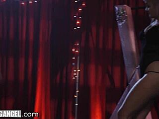 Joanna Angel enters the vip gangbang club with rough double penetration and anal action among latex-clad dancers.